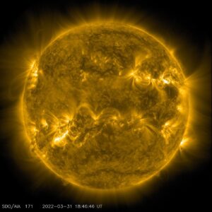 the Sun imaged by a space telescope with a bright flare at its limb